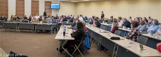 2019 Leadership Symposium Attendees Sitting at Long Tables