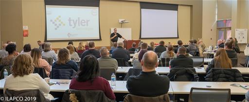 Back of Seated Crowd Looking at Speaker