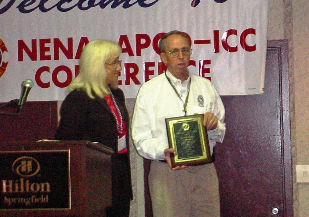 David Swan receives Award from APCO's Chris Fischer Oct 2004 